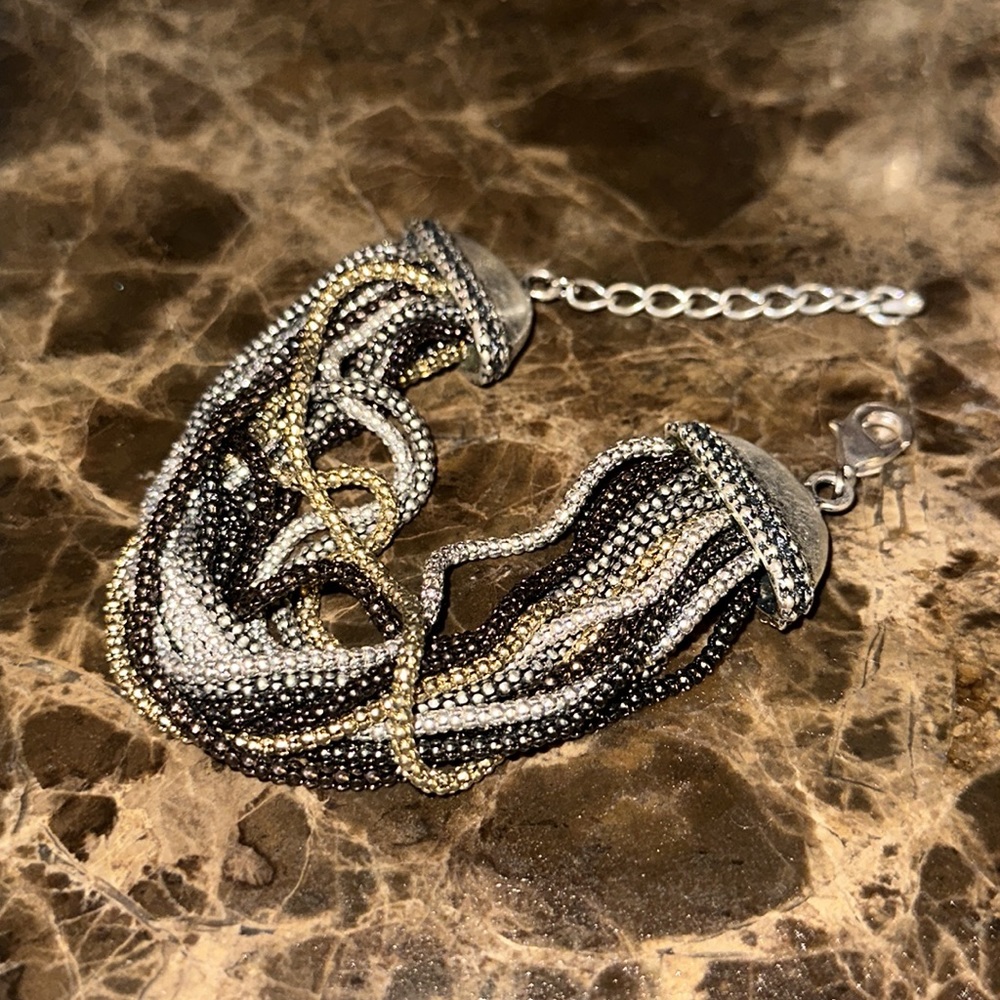 Multiple chain and color beads bracelet stunning on the wrist